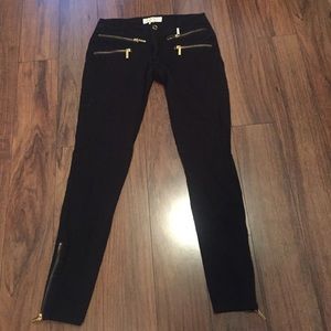 Michael Kors black skinny pants w gold zippers