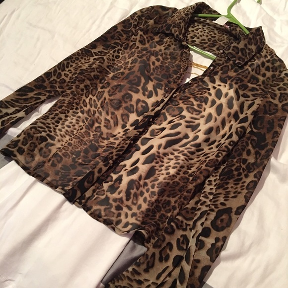 Body central cheetah print open back top