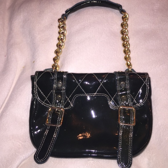 Stunning patent leather bag.