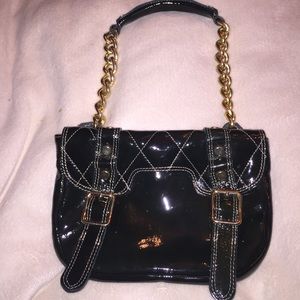 Stunning patent leather bag.