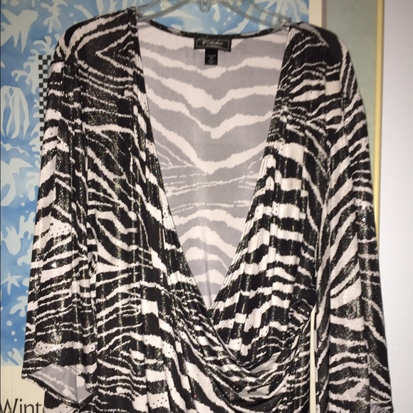 Dressy black and white blouse with silver sequins.
