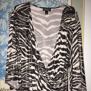 Dressy black and white blouse with silver sequins.