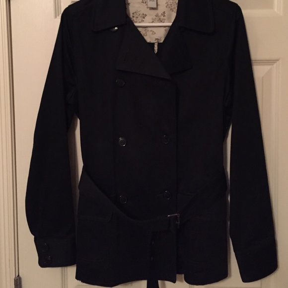Like new black trench coat. Belted. Medium.