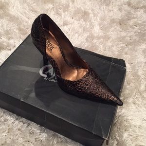 Carlos Santana heels