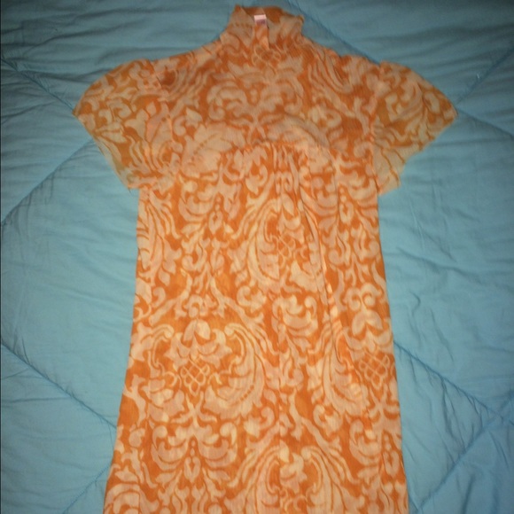 Orange and white sheer top. - Picture 1 of 3