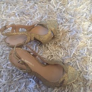 Glittering gold stilettos