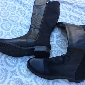 Black stretchy heeled boots