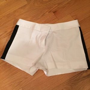 White shorts with black stripe on sides
