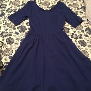 Royal blue fit and flare dress with bow. Pockets!