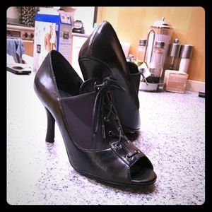 Moda Spana black leather peep-toed stiletto pumps