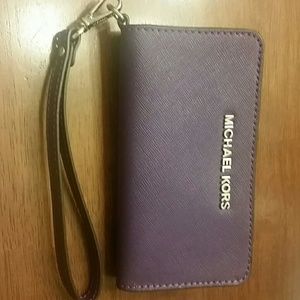 NWOT Michael Kors purple technology wristlet