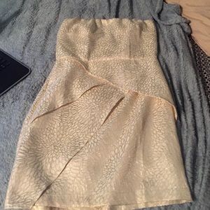 white and gold strapless semiformal