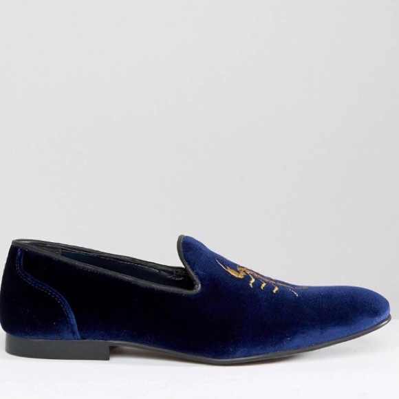 Blue suede scorpion loafers