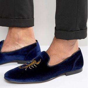 Blue suede scorpion loafers