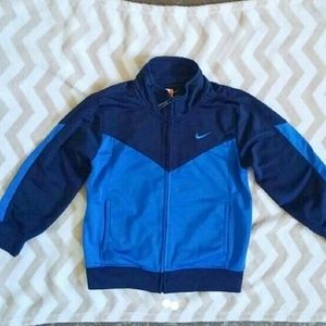 Nike sweater and Adidas pants