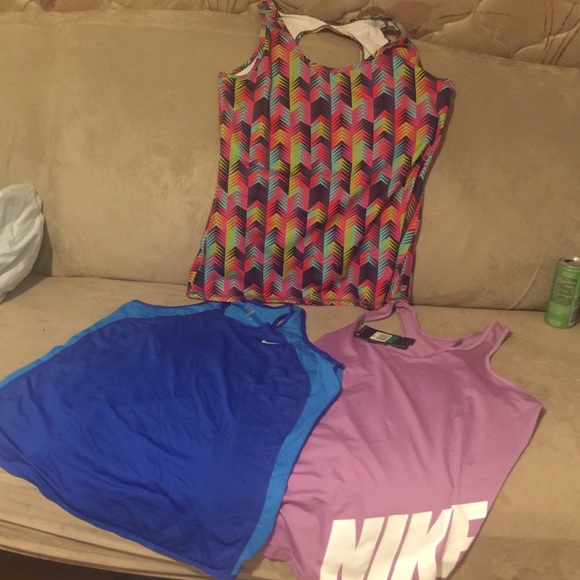 3 XL athletic shirts (Nike, Fabletics)