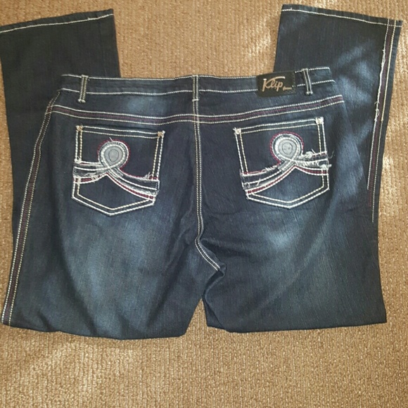 Distressed blue jeans