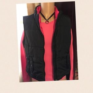 Puffy vest, top and necklace outfit
