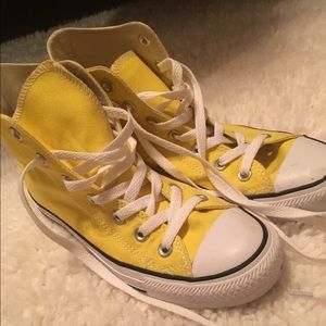 Yellow high top converse