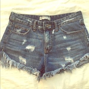 Free people dolphin hem cut off shorts