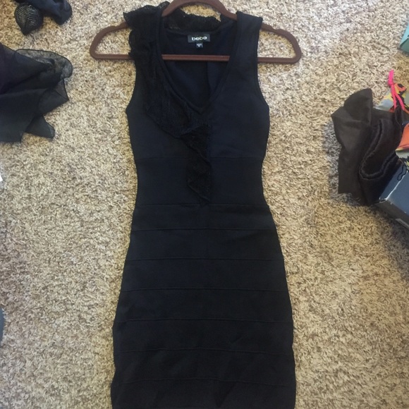 Sexy black bebe bodycon dress with ruffle detail