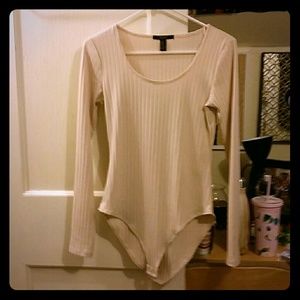 Creme longsleeve bodysuit