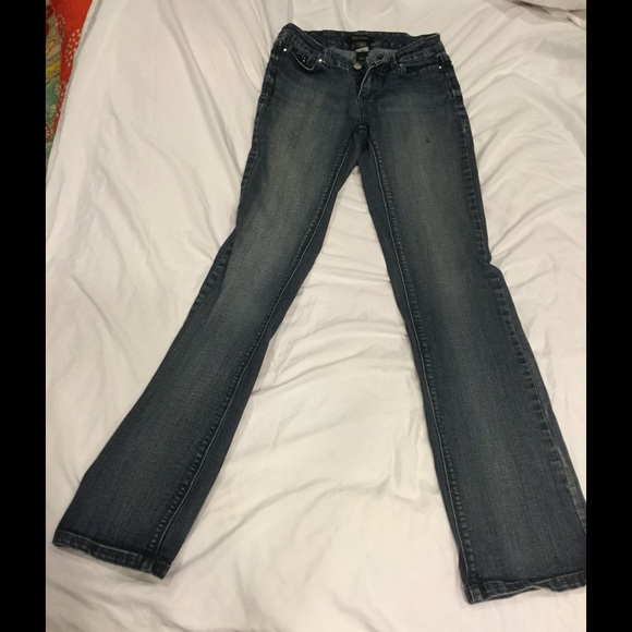 Jeans, small stain on left thigh.