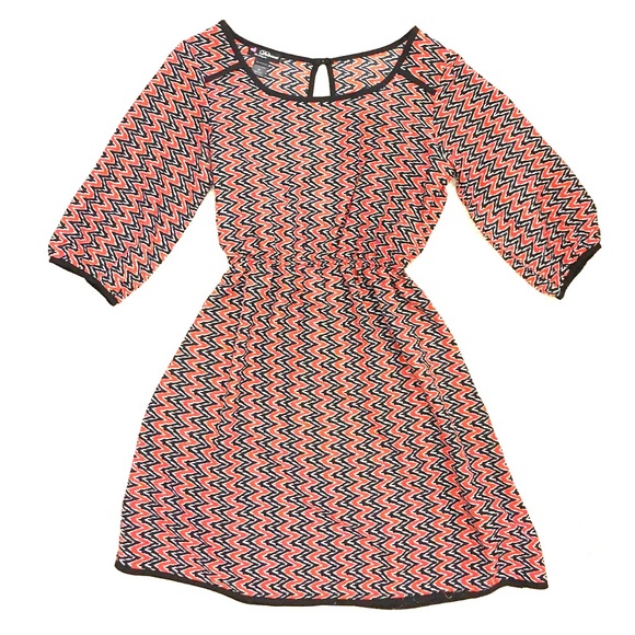 Small orange, black, and white dress