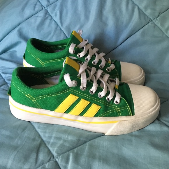Adidas green w/yellow stripes