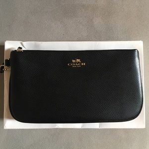 Coach wristlet, new with tags.