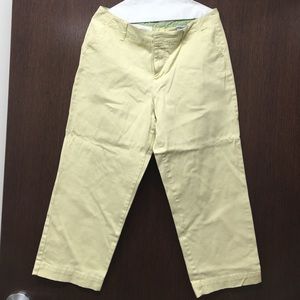 Pale yellow capris.