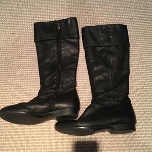 Black size 5 tall boots.