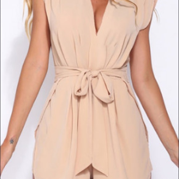 Light pink romper- never been worn