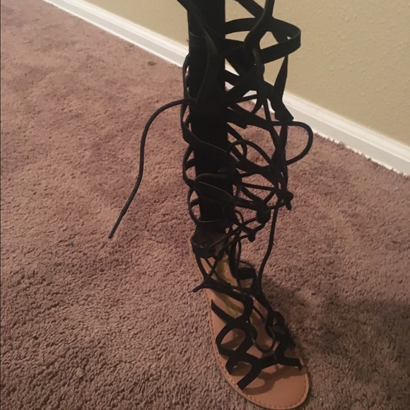 Knee high black gladiator sandals