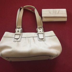 Matching coach purse and wallet.