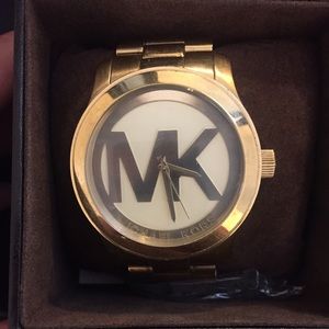 Gold MK watch