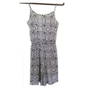 Black and White Floral Romper with Waist Cutout