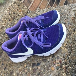 Purple Nike shoes.