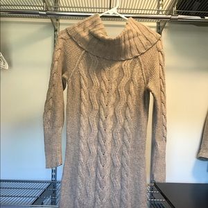 Knee length sweater dress.