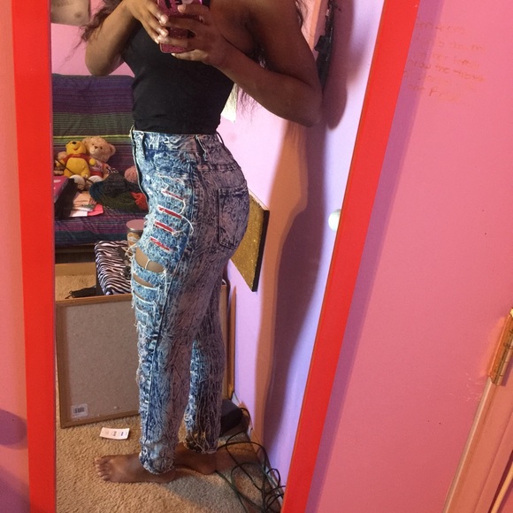 Acid wash ripped jeans