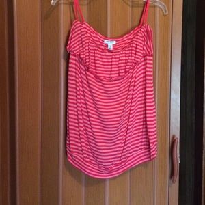 Pink tube top with ruffle.
