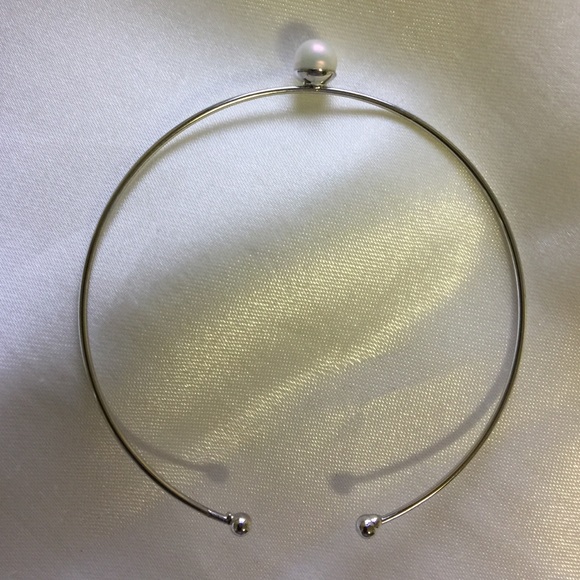 Silver tone pearl bangle bracelet