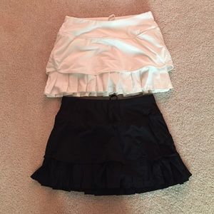 2 athleta tennis/running skorts