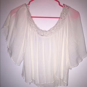 Beautiful white/cream flowing blouse.