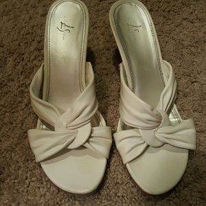 White sandals with heels