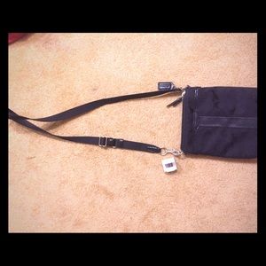 black Coach Crossbody. never been used.