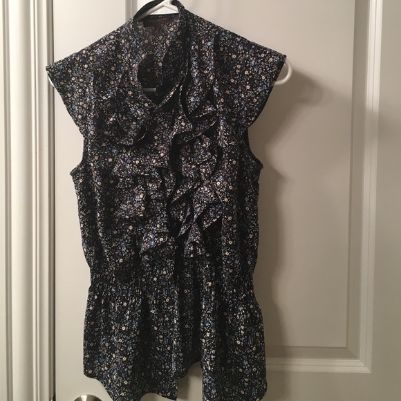 Navy  white floral print blouse.