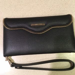 Black Rebecca Minkoff iPhone 6 Plus wristlet.