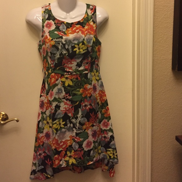 Floral dress.  Longer length in back. Hi-lo