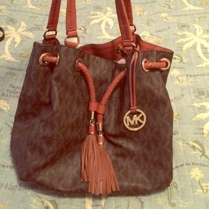Michael Kors brown and beige bucket purse